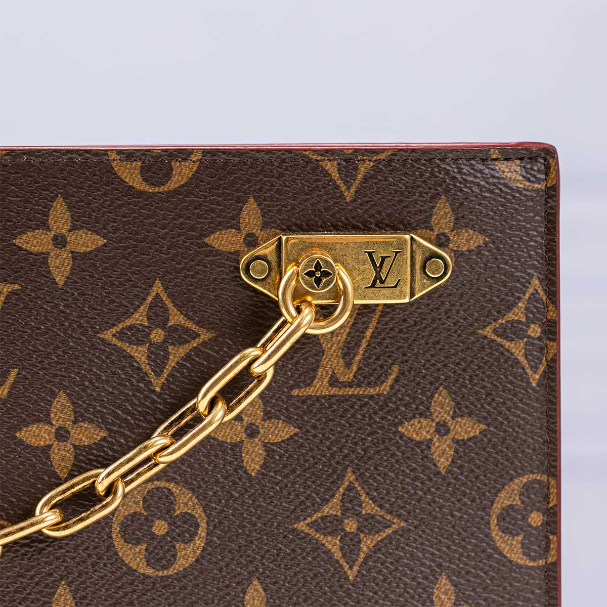 Louis Vuitton Monogram Legacy Chain Clutch